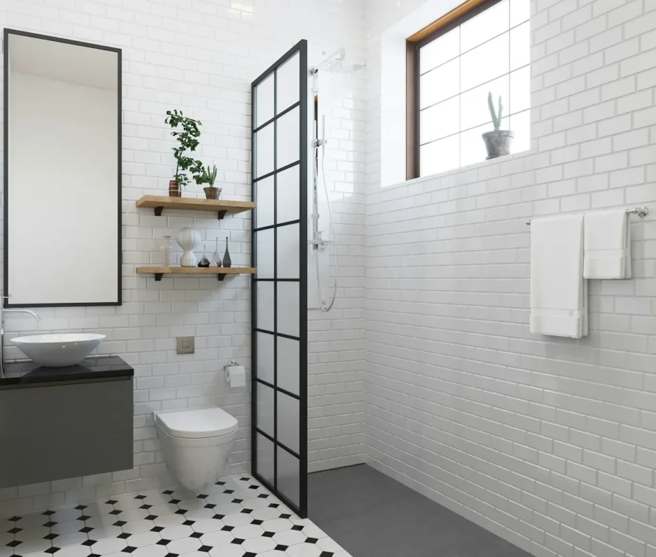 Modern small bathroom with white subway tile vessel sink and glass shower