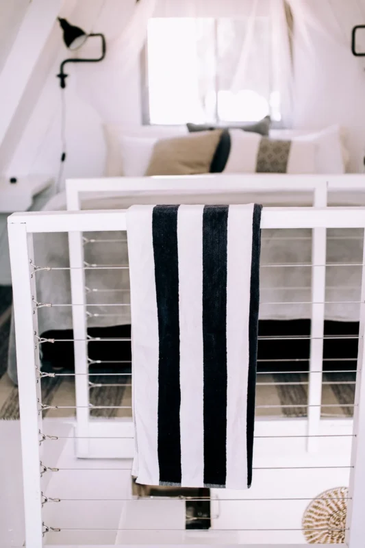 Serene minimalist bedroom with a low white platform bed