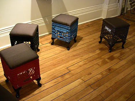 Milk crates used as stools and storage