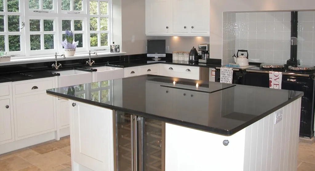 White kitchen with built-in island