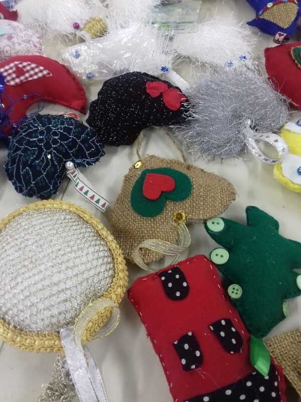 Handmade fabric Christmas ornaments in red green and gold for a small tree