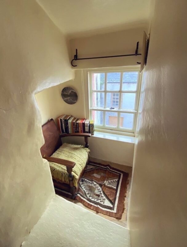 Cozy minimalist reading corner nook for quiet daily rituals