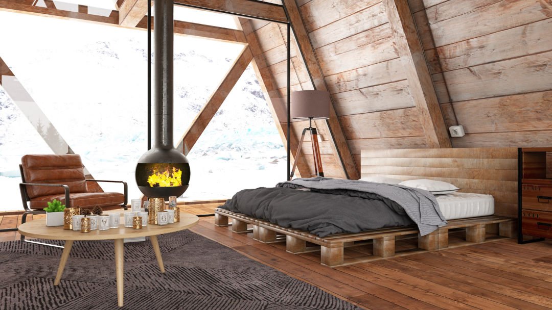 Cozy A-frame cabin bedroom with pallet bed and hanging fireplace